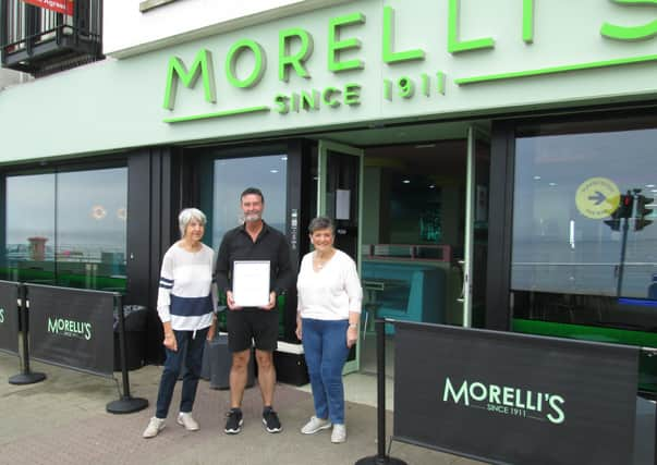 Damian Morelli was recently presented with a 'Certificate of Appreciation' by Claire McCurdy (left) and Dorothy Friar (right)