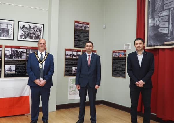 The Mayor of Antrim and Newtownabbey, Cllr Jim Montgomery welcomed Consul General of the Republic of Poland in Northern Ireland Pawel Majewski and Maciek Bator to Ballyclare Town Hall for the opening of For Our Freedom and Yours exhibition.