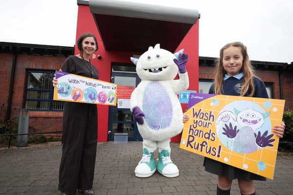 Pictured launching the handwashing resource is Rufus the Handwashing Hero alongside Aileen McGloin from safefood and primary pupilOlivia
