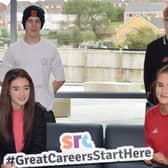 Media students Michael Williamson (L) and Griffin Wilson Brown (R) along with
Health &amp; Social Care students Alice Davidson (L) and Jemma Fisher (R), enjoying their first day at the
new Banbridge Campus of Southern Regional College.
