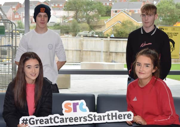 Media students Michael Williamson (L) and Griffin Wilson Brown (R) along with
Health &amp; Social Care students Alice Davidson (L) and Jemma Fisher (R), enjoying their first day at the
new Banbridge Campus of Southern Regional College.