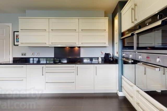 The property features an open plan kitchen.