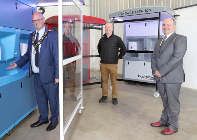 Mayor of Antrim and Newtownabbey, Cllr Jim Montgomery with Ronan Hamill (Jans Composites) and Alan Lowry (Environmental Street Furniture).