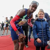Sir Mo Farah’s appearance at the Antrim Coast Half Marathon proved a big draw for eight-year-old Mia Duddy and other fans. Pic by PressEye Ltd.
