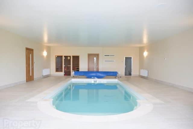 The property has a swimming pool/leisure suite with sauna and steam room