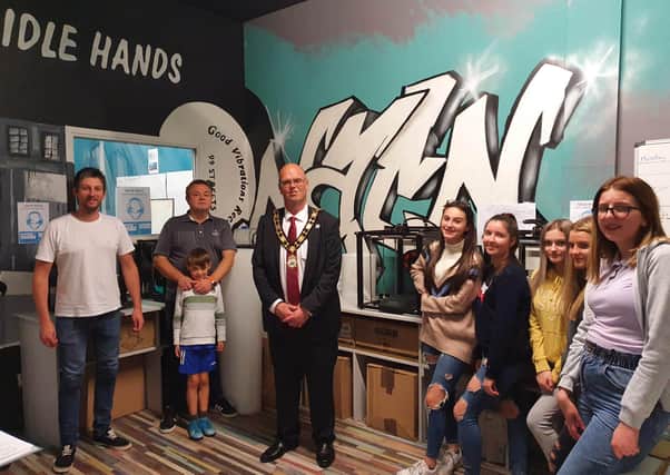 Mayor of Antrim and Newtownabbey, Cllr Jim Montgomery during his recent visit to NACN. He is pictured with Rikki Sawyer, Cllr Robert Foster and his son Rhys, Emma Hosixk, Zoe Longridge, Eve Cosgrove, Carly Richmond and Lauren Douglas.