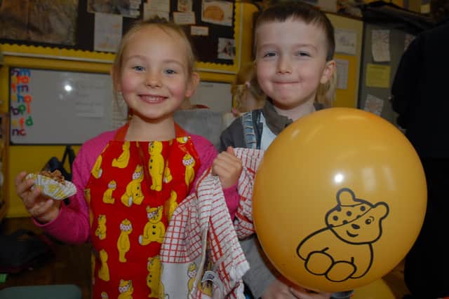 Georgia and William having fun at the Children in Need day at Glynn Primary School. LT47-340-PR