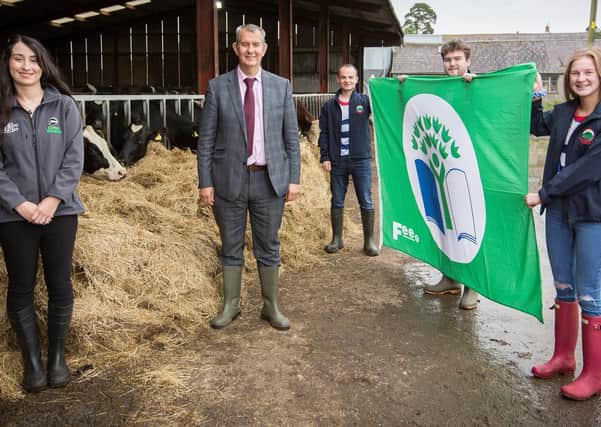 Minister Edwin Poots joins Orlagh McNeill from Ulster Wildlife to present the coveted Eco-Club Green Flag Award to Matthew Moorhead, Scott Kennedy, Alexis Kidd from Lisnamurrican Young Farmers’ Club.