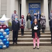 Principal of Hazelwood, Máire Thompson, pictured with staff and students after the award was presented by Education Minister, Peter Weir MLA.