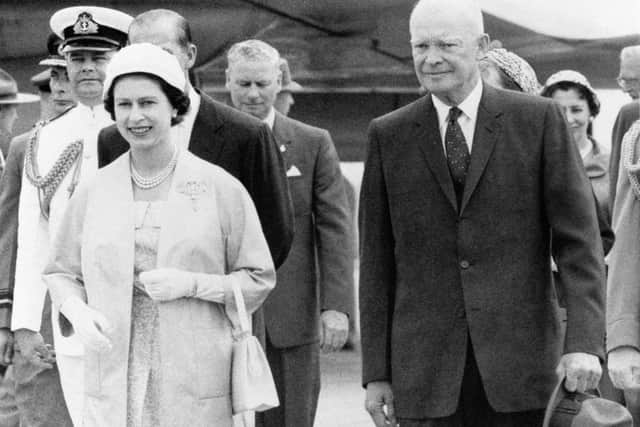 Pictured in June 29, 1956, Her Majesty Queen Elizabeth II and US President Dwight D Eisenhower leaving an airstrip at St Hubert in Quebec. Picture: PA Wire