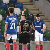 Ross Larkin (right) was sent off in Linfield's 1-0 loss to Floriana. Pic by Pacemaker.