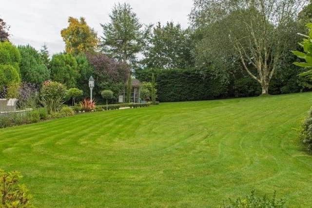 Landscaped gardens provide excellent privacy to the rear