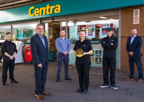 Trevor Magill, Managing Director of Musgrave NI (front left) with the team at Centra Clipperstown Carrickfergus.
