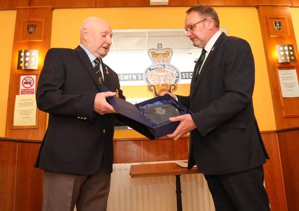 RBL District Chairman John Stewart presenting Ronnie Andrews with the Downing Shield. Photo by Norman Briggs / RnBphotographyni