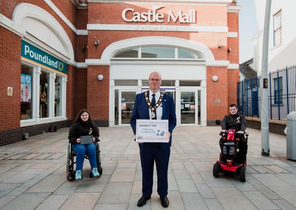 Mayor of Antrim and Newtownabbey, Councillor Jim Montgomery launches the new Disability Hub at Antrim Castle Mall.