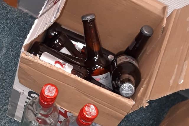 Alcohol seized by officers.