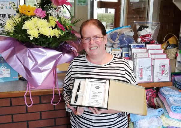 Clough Postmaster Norma Warnock who has received praise and an award for her outstanding customer service