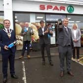 L-R: The Deputy Mayor, Cllr Andrew Wilson, Tony McGurk, founder of Cryptocycle, Eric Randall, Bryson director, Minister Edwin Poots, Dee and Jackie Wright, owners of the Whitehead Spar and Philip Thompson, MEA director of Operations.