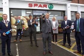 L-R: The Deputy Mayor, Cllr Andrew Wilson, Tony McGurk, founder of Cryptocycle, Eric Randall, Bryson director, Minister Edwin Poots, Dee and Jackie Wright, owners of the Whitehead Spar and Philip Thompson, MEA director of Operations.