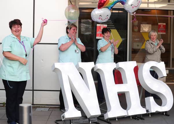 NHS staff outside Belfast City Hospital's tower block.
 
Photo by Kelvin Boyes  / Press Eye.