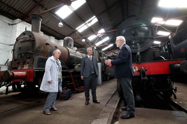 Rural Affairs Minister Edwin Poots at the Railway Museum with Dr Joan Smyth CBE and Rev Canon John McKegney.