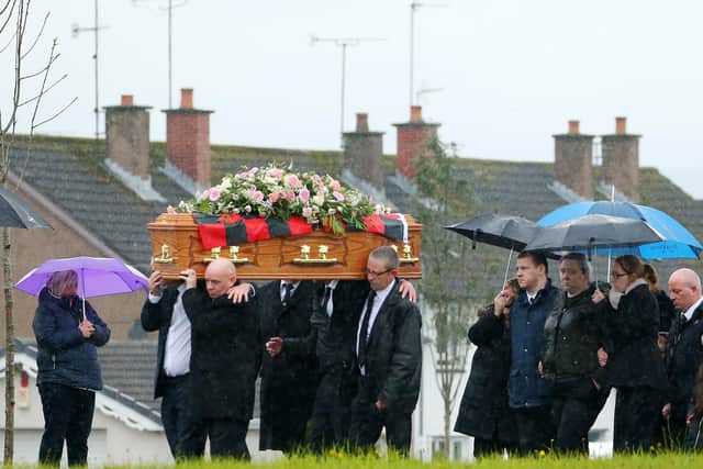 Mourners, including mother Martha and other family members, follow Brooke Reid's coffin