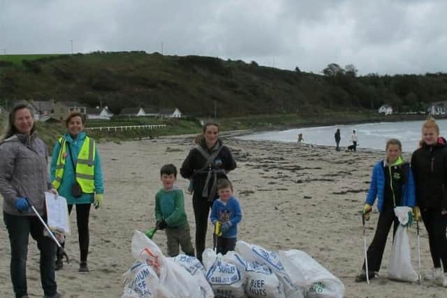 Volunteers joined the Marine Conservation Society and Elena Aceves-Cully (second from left) to clean-up and survey Brown's Bay beach, Islandmagee.