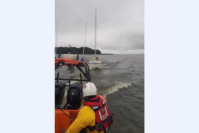 Lough Neagh Rescue tow stranded vessel from Coney Island.
