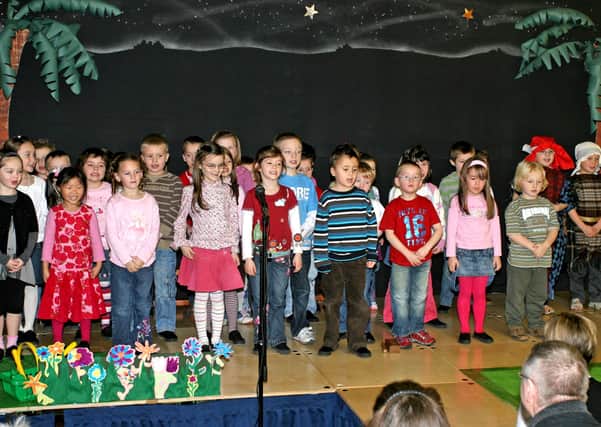 Primary 1 and 2 children from Kells and Connor PS on stage during their annual nativity play. BT51-250AC