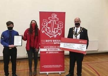 Ross pictured with Grace and Cllr Montgomery.