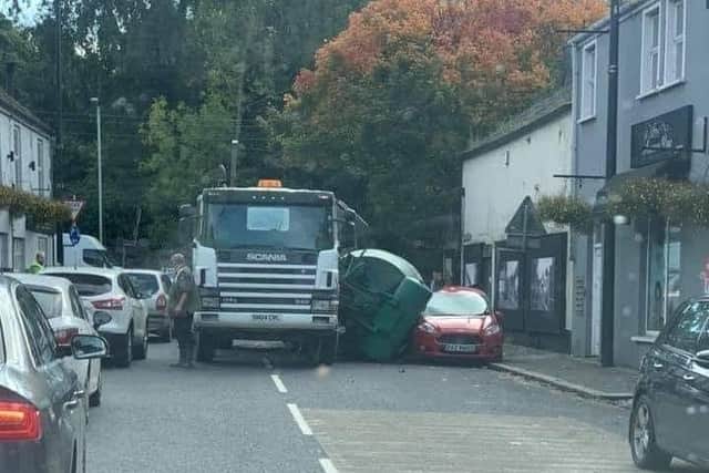 Cement lorry overturns