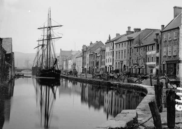 Ships on the canal at Merchants Quay in Newry, alongside a nice brace of merchants' premises. Picture: National Library of Ireland