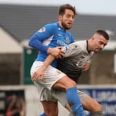 Glenavon’s Seamus Sharkey tussles with his now new Institute team-mate Alex Pomeroy, during their game last season. Picture by David Maginnis - Pacemaker Press