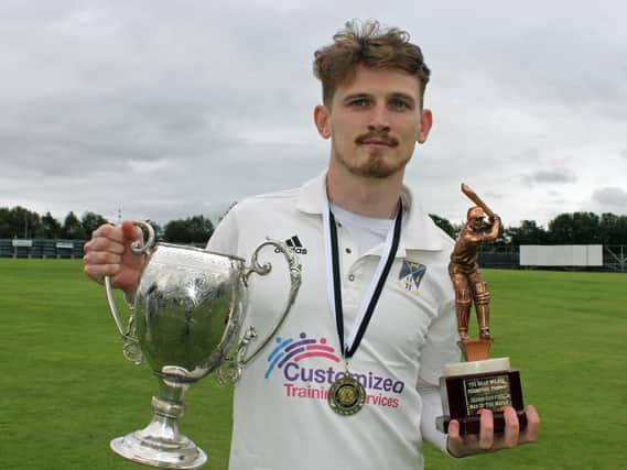 Donemana's Dean Mehaffey with the North West Senior Cup and the Man of the Match Award, after his superb display in the final against Brigade. Picture by Barry Chambers