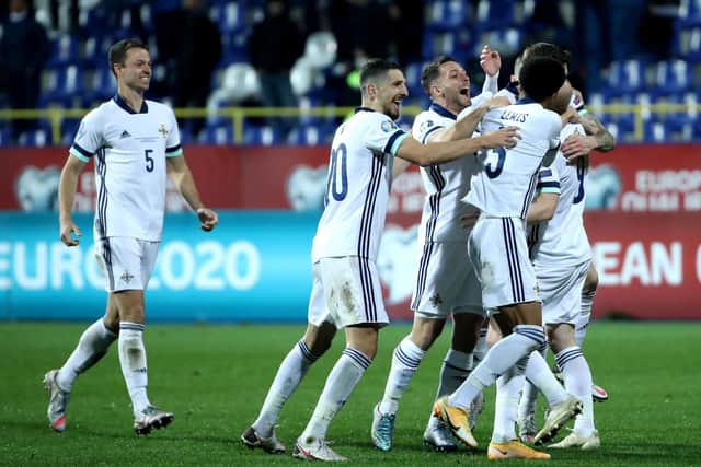 Northern Ireland players celebrate after defeating Bosnia and Herzegovina on penalties in Thursday night's Euro 2020 playoff semi final at the Stadion Grbavica, Sarajevo. Photo by William Cherry/Presseye