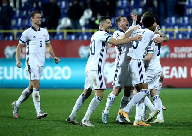Northern Ireland players celebrate after defeating Bosnia and Herzegovina on penalties in Thursday night's Euro 2020 playoff semi final at the Stadion Grbavica, Sarajevo. Photo by William Cherry/Presseye
