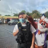 Police uploaded the image from the fundraising event to social media.