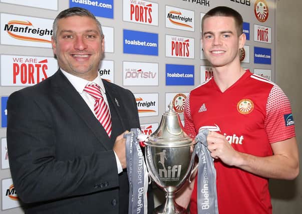Portadown manager Matthew Tipton and captain Luke Wilson with last season's NIFL Championship trophy. Pic by Pacemaker.