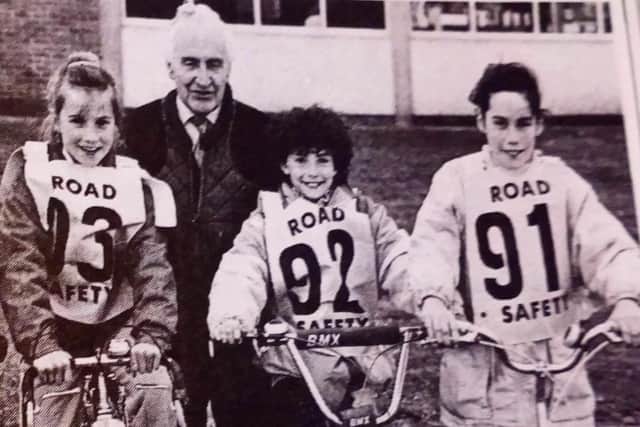 Ken McKee (chair of Ballymena Road Safety Committee) with some of the competitors in the annual Cycling Proficiency Competition at Dunclug High School.
1989
