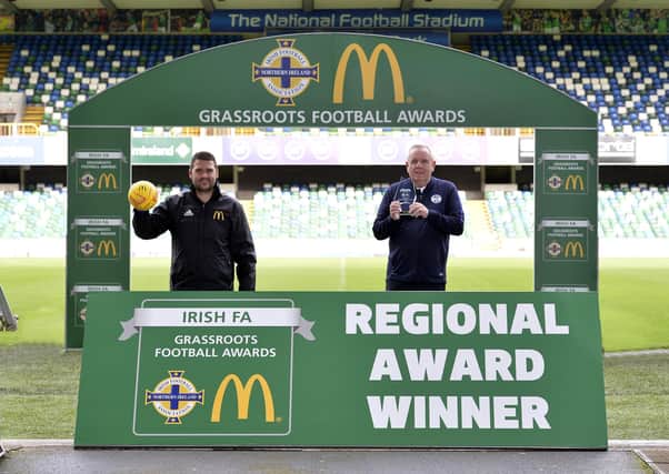 Pictured is Volunteer of the Year David Cunningham from Ballymoney United Youth Academy alongside former Northern Ireland international striker David Healy at the National Football Stadium at Windsor Park