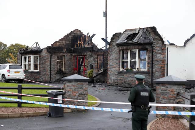 PSNI officers attend a house fire Annaghbeg Road, Dungannon. The blaze was reported to police shortly after 10:20pm on Monday night.  Police and other emergency services responded.