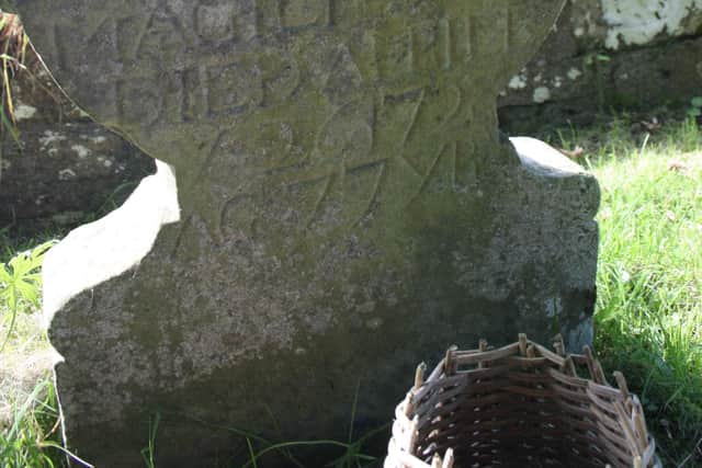 One of the old gravestones at Aghalurcher monastic site in Co Fermanagh. You can just make out that the person died aged 77 years in 1728, so just prior to the death of Major Noble in 1731. Picture: Darryl Armitage
