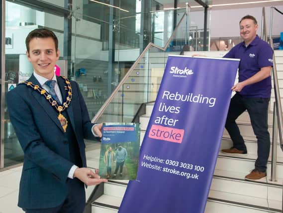 Mayor of Mid and East Antrim, Councillor Peter Johnston, chats with Marc Dyer, Volunteering and Community Manager, Stroke Association.