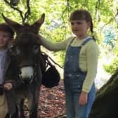 Young Actors Jude Hill and Savanna Burney Keatings with Denis the Donkey
