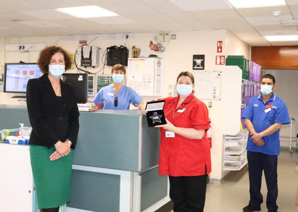 Pictured presenting the award to some of the staff from Coronary Care Unit in Lagan Valley Hospital is Nicki Patterson (Director of Nursing, Primary Care and Older People),   Maria Adams (Staff Nurse), Michelle Cairns (Ward Sister) and Cyjo Thomas (Deputy Charge Nurse)