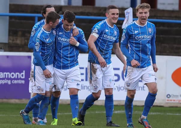 Ben Doherty and team-mates following his Coleraine goal on Saturday against Glentoran. Pic by Pacemaker.