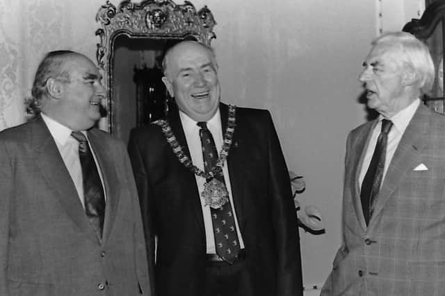Sharing a joke at a City Hall reception in October 1987 are Sir Myles Humphries, chairman of the Northern Ireland Railways and of the Northern Ireland board of the Abbey National Building Society, the Lord Mayor of Belfast Alderman Dixie Gilmore and Sir Campbell Adamson, chairman of the Abbey National Building Society. Picture: News Letter archives