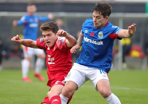 Portadown's George Tipton (left) and Jordan Stewart of Linfield competing at Shamrock Park. Pic by Pacemaker.