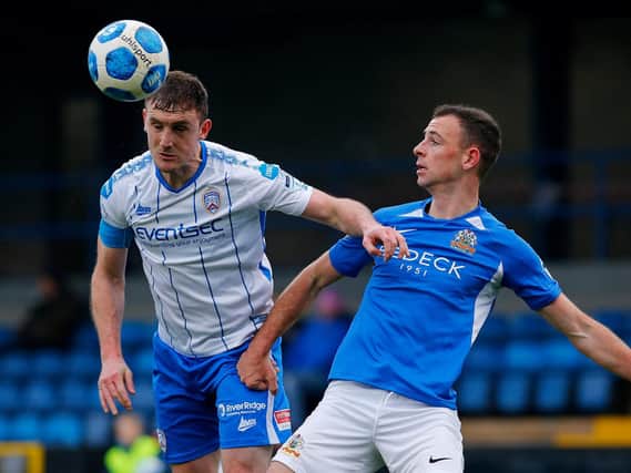 Coleraine's Stephen O'Donnell tussles with Glenavon's Matthew Fitzpatrick