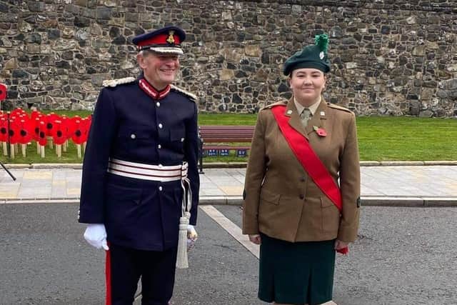 Cadet Sergeant Major Emma Ellison from Larne Detachment with HM Lord Lieutenant for County Antrim Mr David McCorkell at the Cenotaph, Market Square. Antrim.